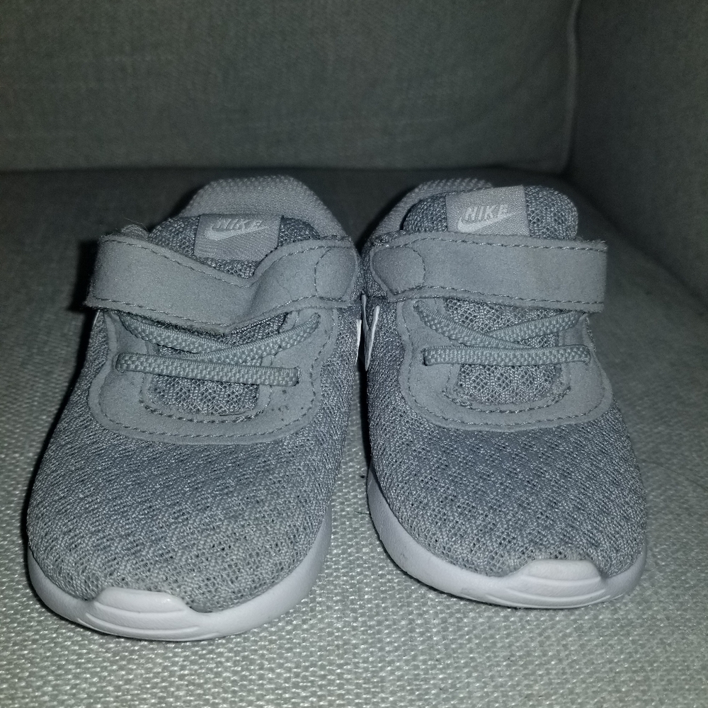 Gray toddler Nike sneakers